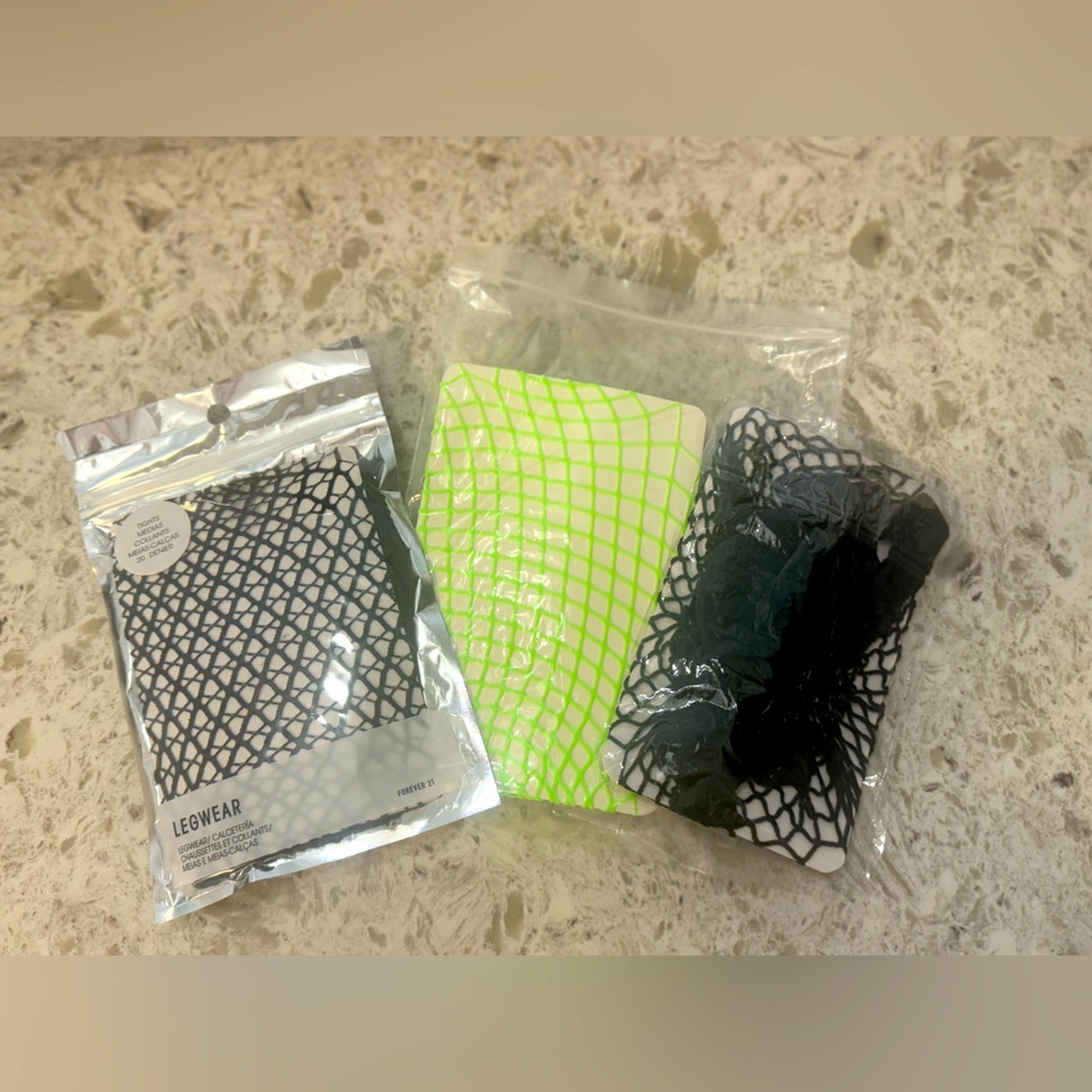 3 pairs of Fish Net Legwear. New never worn!
